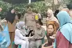 Masyarakat-berbondong-bondong-mendatangi-posko-kesehatan-di-lokasi-banjir.jpg