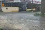 PRAKIRAAN-CUACA-Potret-sebuah-jalan-di-Sulawesi-Utara-saat-diguyur-hujan.jpg