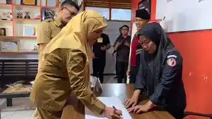 Plt-Bupati-Maros-Suhartina-Bohari-dan-suaminya-Baso-Arman-saat.jpg