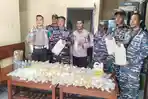 Berlabuh di Timika, Penumpang KM Tatamailau Kedapatan Membawa Ratusan Liter Miras Jenis Sopi