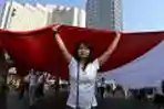 Bawa Bendera Merah Putih Raksasa Peringati 11 September