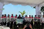 Sekda-Surya-Suamba-saat-menghadiri-acara-peluncuran-kapal-pengelolaan-sampah1.jpg