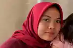 Seorang-karyawati-pabrik-bernama-Santi.jpg