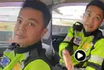 Anggota-polisi-yang-terekam-dalam-video-viral-saat-melakukan-pemeriksaan.jpg