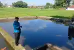 Salah-satu-kolam-ikan-yang-sempat-dikuras-diduga-oleh-kawanan-pencuri.jpg