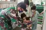 Satgas Yonif 642/Kapuas Dirikan Perpustakaan Mini Bagi Anak-anak