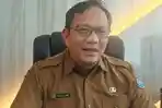 Kepala-Dinas-Koperasi-dan-UKM-Tangsel.jpg
