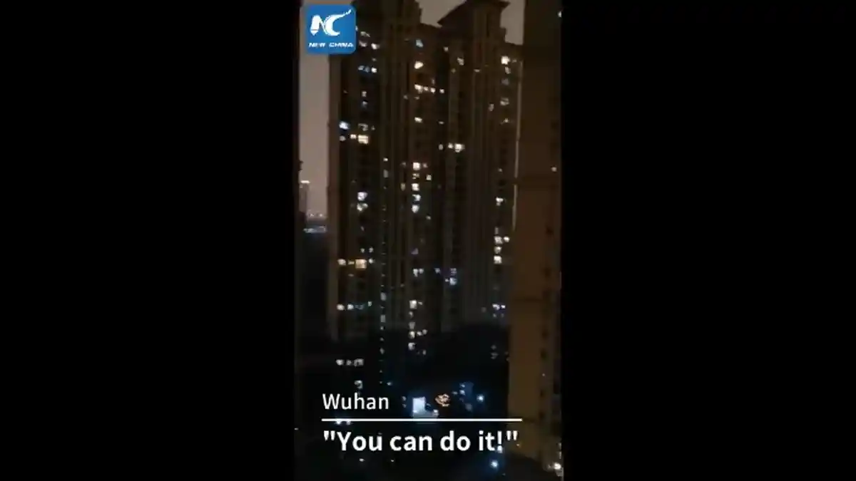 Viral Video Warga Wuhan Dikarantina Saling Teriakan Bersahutan Beri Semangat Hadapi Corona