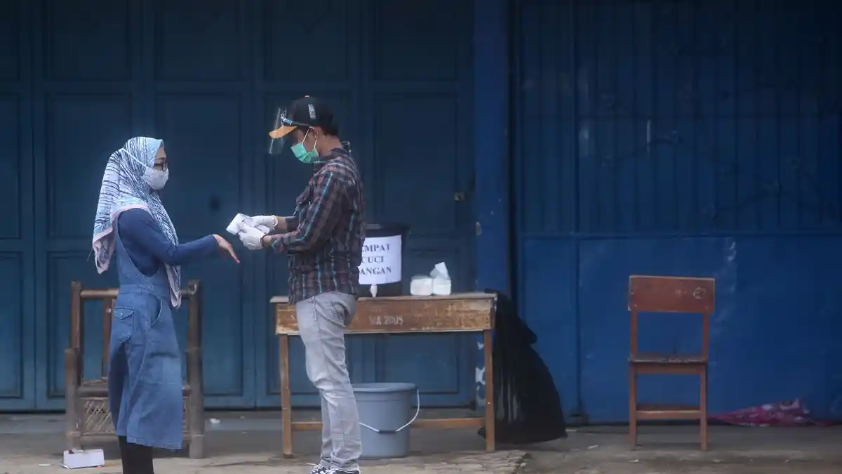 Kisah Petugas KPPS & Pasien Covid-19 di Pilkada 2020, Datangi Tempat Isolasi, Ada yang Batal Nyoblos