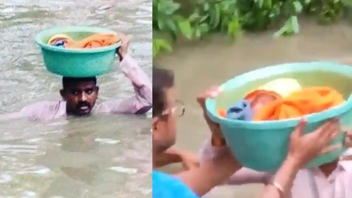VIRAL! Tanpa Takut Buaya Pria Ini Selamatkan Bayi Usia 45 Hari Dengan Baskom Dari Kepungan Banjir