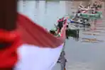Pembentangan Kain Bendera 1.000 Meter di Atas Laut Pantai Losari