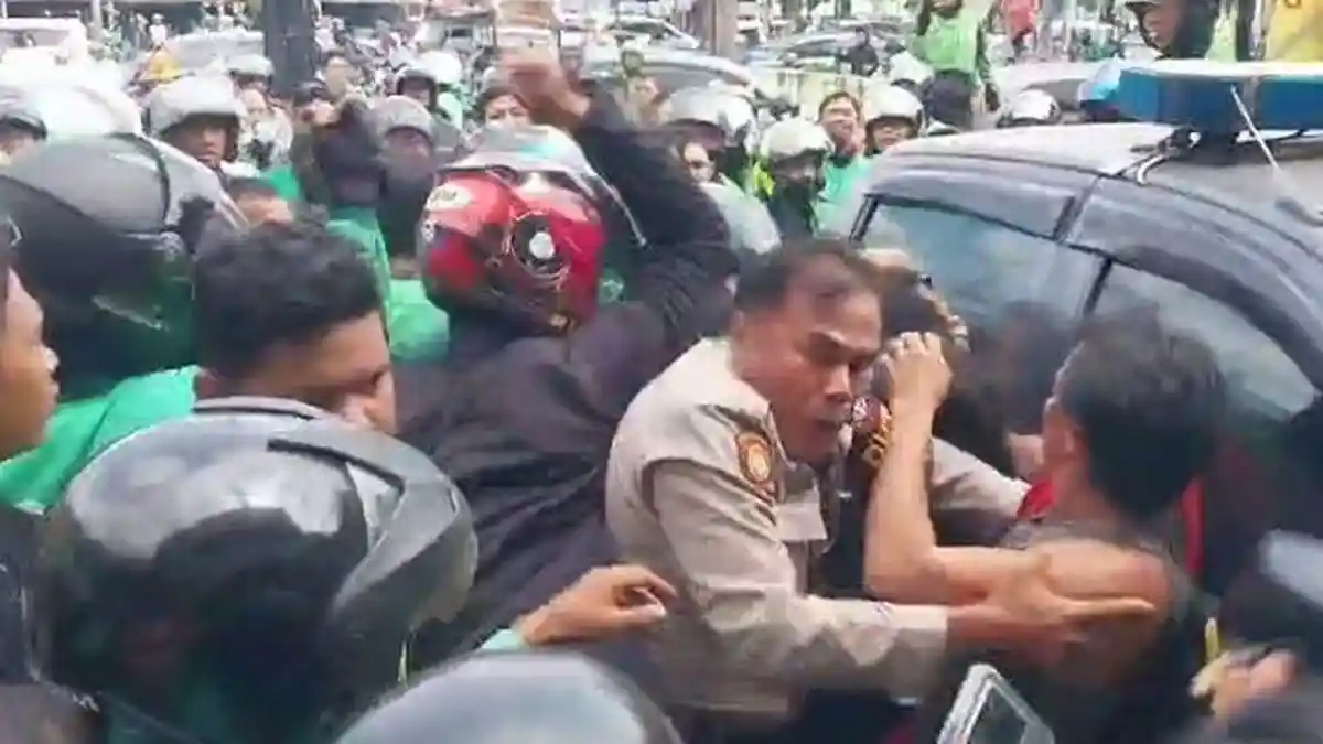 Viral Ratusan Driver Ojol Luapkan Amarah ke Juru Parkir Buntut Rekannya Dianiaya, Ini Kata Polisi