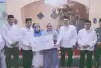 Wabup Muara Enim Serahkan Santunan BPJS Ketenagakerjaan di Safari Ramadan