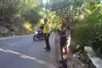 Polres-Malang-melakukan-pengamanan-jalan-atas-kecelakaan-tunggal-di-druju.jpg