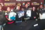Polisi-menunjukkan-barang-barang-milik-GH-53-tersangka-penculik-balita-17-bulan.jpg