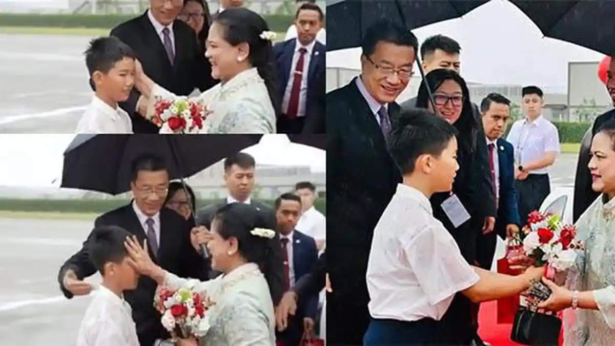 Momen Iriana Jokowi Usap Wajah Bocah yang Rela Basah Kuyup Bikin Salfok, Videonya Viral di Medsos