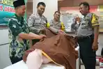 Sukseskan Progam Demak Takziah, Anggota Bhabinkamtibmas Ikuti Pelatihan Merawat Jenazah