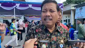 Wali-Kota-Pangkalpinang-pakai-batik-hitam.jpg