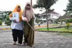 Melihat Penyandang Tuna Netra Tadarus Al Quran