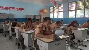 anak-kelas-6-di-SD-Negeri-42-Palembang-sedang-mengikuti-ujian.jpg