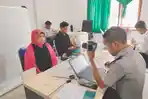 Petugas-imigrasi-mof.jpg