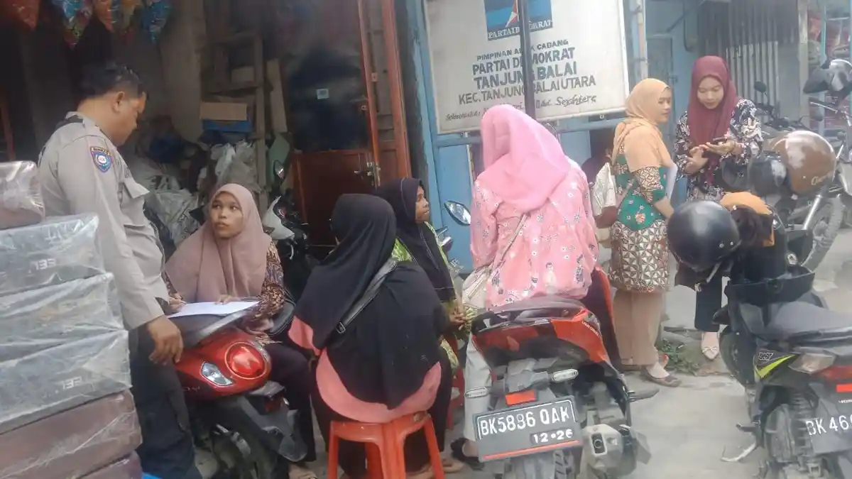 Bhabinkamtibmas Polsek Tanjung Balai Utara Cooling System, Jaga Kamtibmas Menjelang Pilkada 2024