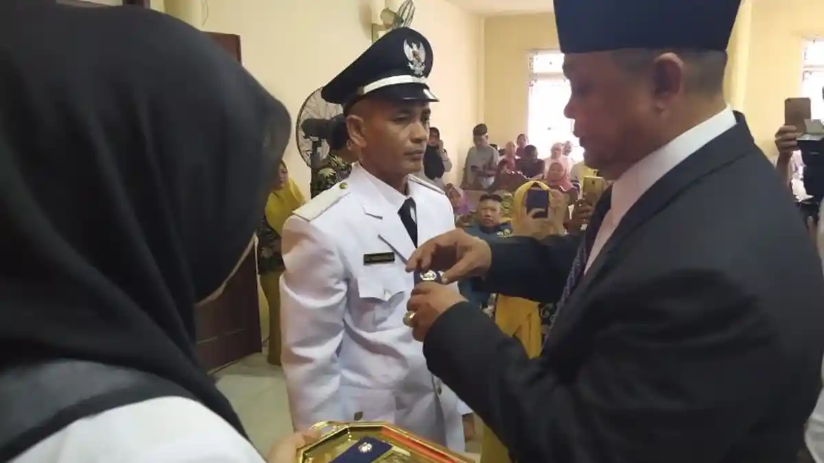 Marzuki Abdullatif Dilantik Sebagai Keuchik Kampung Jawa, Ini Pesan Kepala DPMG Lhokseumawe Bukhari