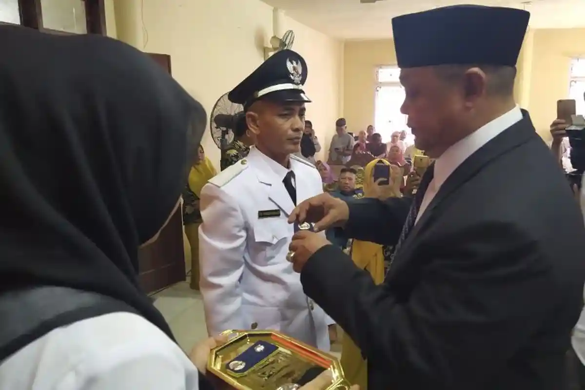 Marzuki Abdullatif Dilantik Sebagai Keuchik Kampung Jawa, Ini Pesan Kepala DPMG Lhokseumawe Bukhari