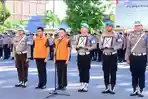Kapolda-Jambi-Krisno-H-Siregar-memimpin-langsung-upacara-pemberhentian.jpg