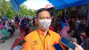 Kepala-PT-Pos-Indonesia-KCU-Kendari-Wildan-Hamdani.jpg