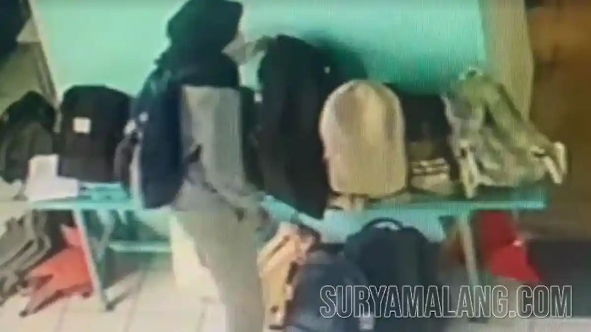 Jilbab dan Masker Jadi Kedok Pencuri Laptop dan HP Para Siswa SMAN 2 Sidoarjo