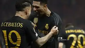 ekpresi-pemain-real-madrid-dani-ceballos-dan-jude-belingham-usai-cetak-gol.jpg