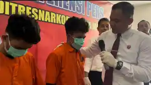 Kurir-narkoba-yang-diamankan-Polda-Jambi.jpg