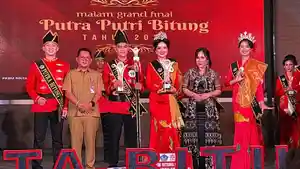 Julio-Mak-utusan-BKPSDMD-Bitung-dan-Cindy-Bella-Tumundo-utusan-Sekretariat.jpg