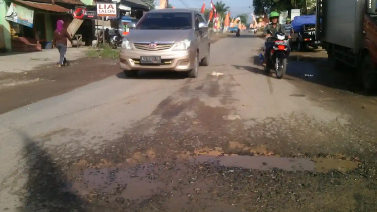 Peda KTNA Lampung Akan Berlangsung di Kampung yang Jalannya Penuh Lubang Ini