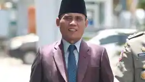 Kadis-Pendidikan-Kotamobagu-Jufri-Ngandu-bgghyty.jpg