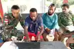 Satgas Yonif 126/KC Ajarkan Pemuda Papua Operasikan Laptop