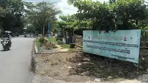 Taman-Hijau-menghiasi-sisi-Jalan-Belitung-Darat-Area-yang-dulu-sempat-dipenuhi-tumpukan-sampah.jpg