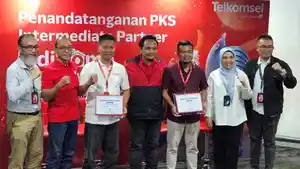 Penandatanganan-kerja-Telkomsel-Rabu-1382025.jpg