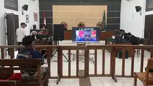 Terdakwa-Marsel-hadir-secara-daring-lewat-skema-konferensi-video.jpg