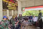 01062023-Warga-Long-Apari-menyerahkan-senjata-rakiran-kepada-prajurit-TNI-di-Perbatasan.jpg