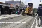Perbaikan-jalan-rusak-di-Pekanbaru-Riau.jpg