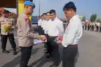 Pengawasan Personel, Si Propam Polres Pelabuhan Belawan Cek Izin Senjata Api