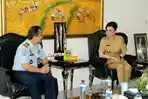 ronny-sompie-dalam-pertemuan-dengan-bupati-doktor-christiany-eugenia-paruntu.jpg