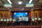 Pj-Gubernur-Aceh-Beri-Bonus-Kepada-23-Peserta-yang-Juara-di-MTQ-Nasional-2022-Kalsel.jpg