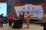 penandatanganan-nota-kesepahaman-ldbd-kumkm-dan-kejati-sulsel.jpg