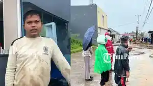 MOMEN-Isal-Satpam-di-Padang-Selamat-Usai-Bergelantung-di-Atap-Pos-Dihantam-Banjir-2-Meter.jpg