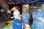 Tes Swab PCR Massal Omicron Pedagang Tangerang
