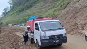 Sat-Lantas-Parimo-Imbau-Pengendara-Waspadai-Longsor-dan-Jalan-Licin-di-Jalur-Kebun-Kopi.jpg