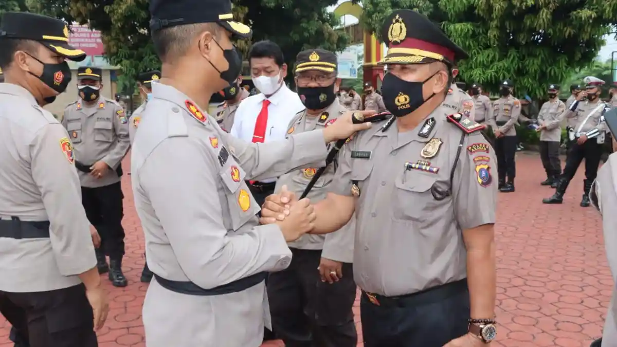 Kapolres Asahan Pimpin Upacara Kenaikan Pangkat Pengabdian Kompol Sabran Muslim